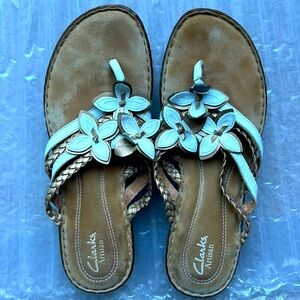 Clark’s Artisan white floral designed all leather sandals with comfort soles.